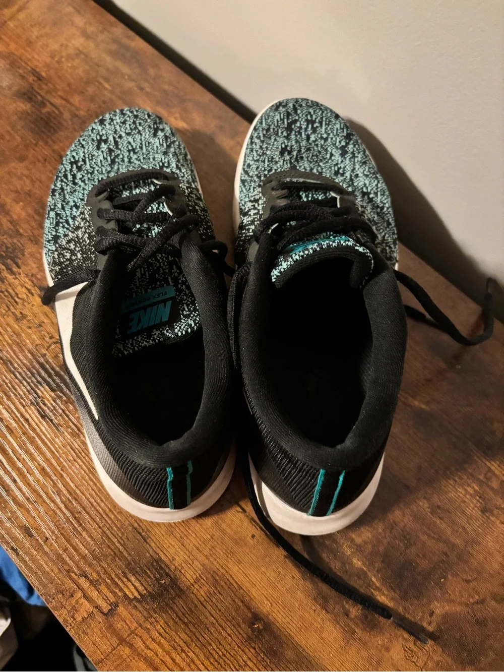Nike Black Sneakers with Teal Accent